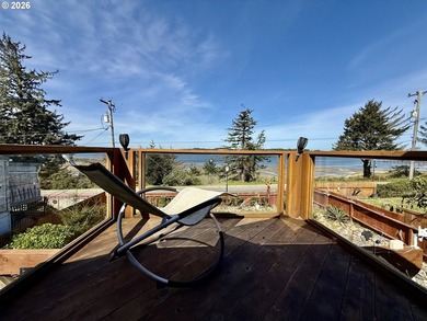 Take in the bay views while enjoying a blazing fire in this - photo 32