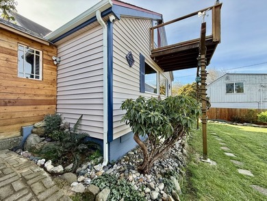 Take in the bay views while enjoying a blazing fire in this - photo 34