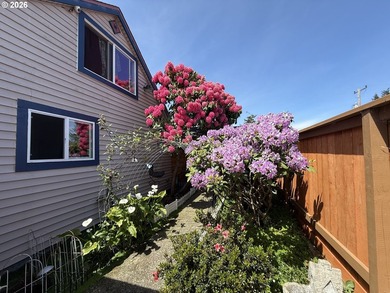 Take in the bay views while enjoying a blazing fire in this - photo 36