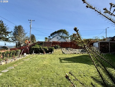 Take in the bay views while enjoying a blazing fire in this - photo 42