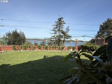 Take in the bay views while enjoying a blazing fire in this - photo 43