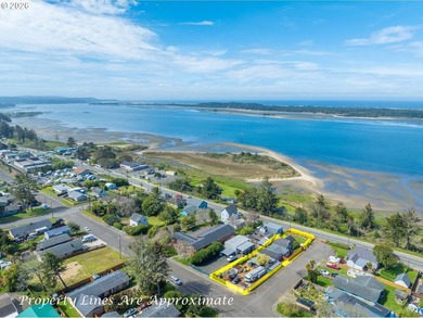 Take in the bay views while enjoying a blazing fire in this - photo 45