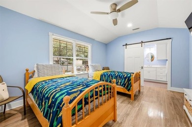 Set beneath a quiet canopy of live oaks, 636 Old Plantation Road - photo 49