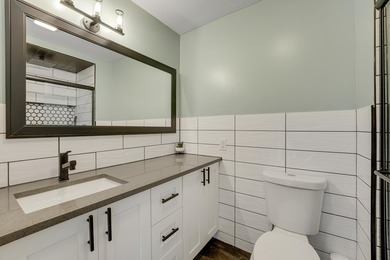 This stunning two-story residence has been completely remodeled - photo 24