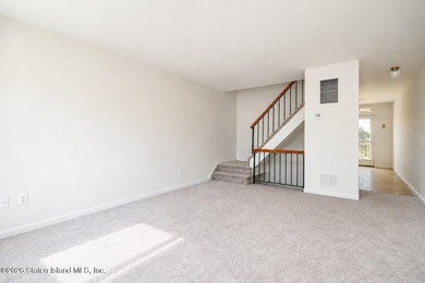 Welcome to 50 Zachary Ct. This 2-bedroom, 3-bathroom townhouse - photo 5