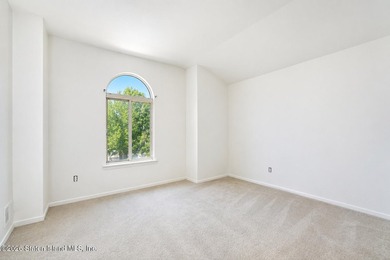 Welcome to 50 Zachary Ct. This 2-bedroom, 3-bathroom townhouse - photo 9
