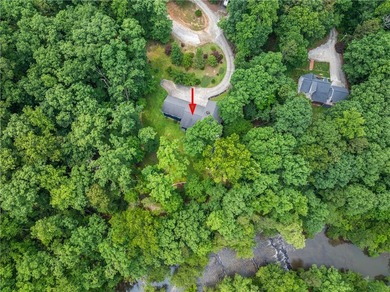 Experience the best of riverfront living with this custom-built - photo 4