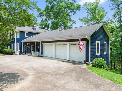 Experience the best of riverfront living with this custom-built - photo 5