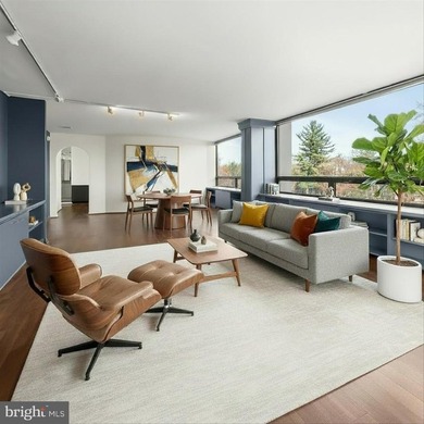 Mid-Century Modern style meets panoramic views in this expanded