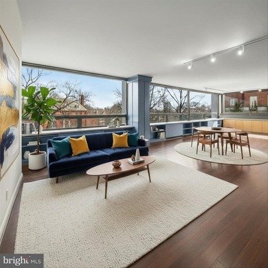 Mid-Century Modern style meets panoramic views in this expanded