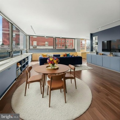 Mid-Century Modern style meets panoramic views in this expanded