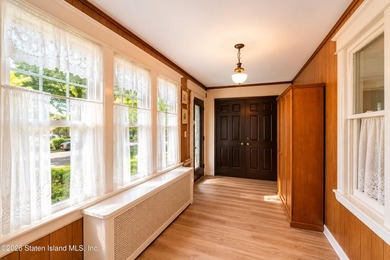Welcome to 73 Walnut Street! Step into the inviting sunroom, a - photo 4