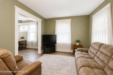 Welcome to 73 Walnut Street! Step into the inviting sunroom, a - photo 7