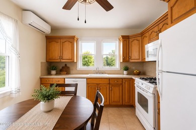 Welcome to 73 Walnut Street! Step into the inviting sunroom, a - photo 10