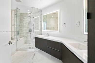 This spectacular, 2 bedrooms + den 3 full baths unit in