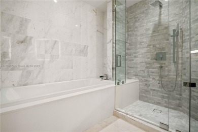 This spectacular, 2 bedrooms + den 3 full baths unit in