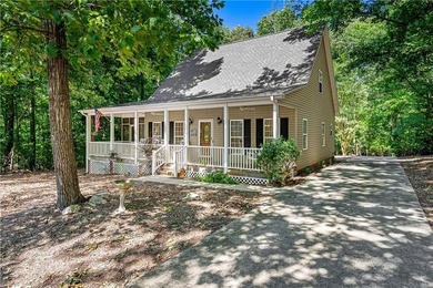 Welcome to this beautifully maintained home nestled in the - photo 1