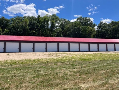 Two storage buildings: 3,400 sq. ft. and a 9,010 sq. ft. - 44 - photo 12