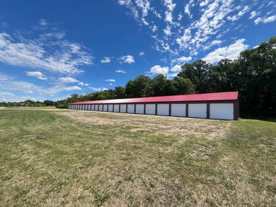 Two storage buildings: 3,400 sq. ft. and a 9,010 sq. ft. - 44 - photo 13