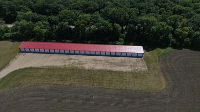 Two storage buildings: 3,400 sq. ft. and a 9,010 sq. ft. - 44 - photo 18