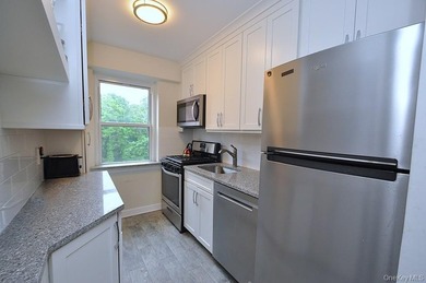 Welcome home to this sun-drenched and beautifully spacious - photo 8
