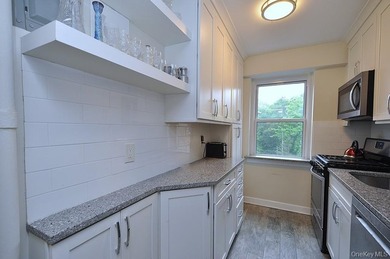 Welcome home to this sun-drenched and beautifully spacious - photo 9