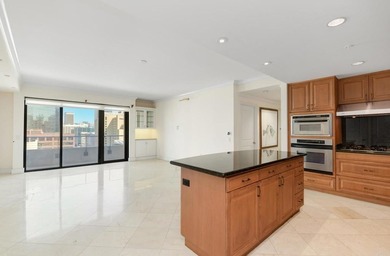 Perched on the 13th floor of the coveted Renaissance, Residence - photo 7