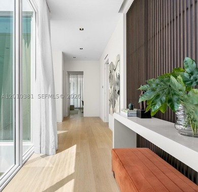 This one-of-a-kind, two-story waterfront villa, designed by - photo 11