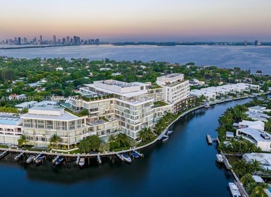 This one-of-a-kind, two-story waterfront villa, designed by - photo 17