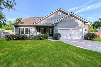 Enjoy this single level, 3BR/2BA open floor plan home on almost - photo 1