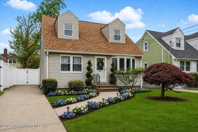 This charming fully detached Cape-style home offers a rare - photo 1