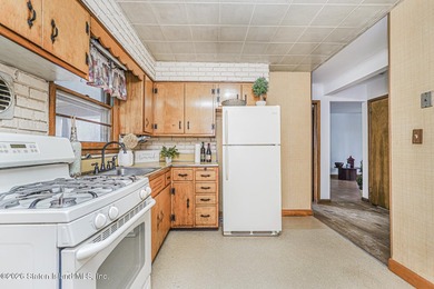 This charming fully detached Cape-style home offers a rare - photo 8