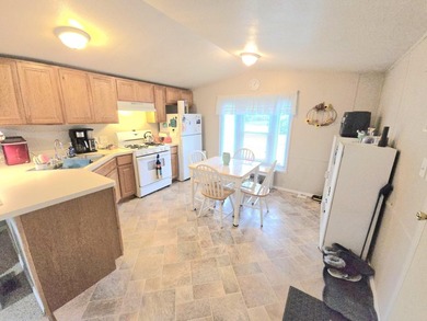 BACK ON THE MARKET!! Charming 2 bedroom 1 full bath home, fenced - photo 13