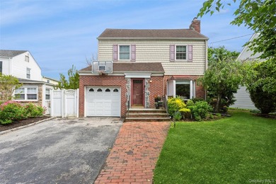 Located In The Exclusive Section of East Rockaway in the - photo 1
