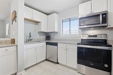 Discover true coastal living in this beautifully updated 2 - photo 1
