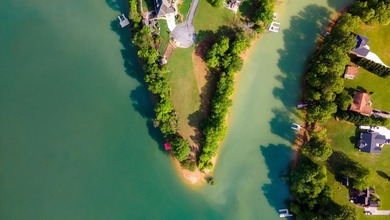 Wow!! What a great piece of property! This level lakefront lot - photo 3