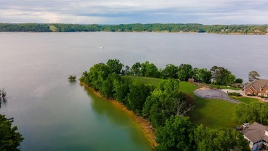Wow!! What a great piece of property! This level lakefront lot - photo 4