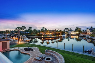 Canal-front living with direct Gulf access defines this - photo 1