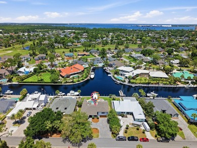 Canal-front living with direct Gulf access defines this - photo 3