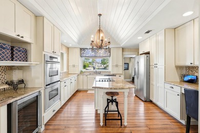 Canal-front living with direct Gulf access defines this - photo 4