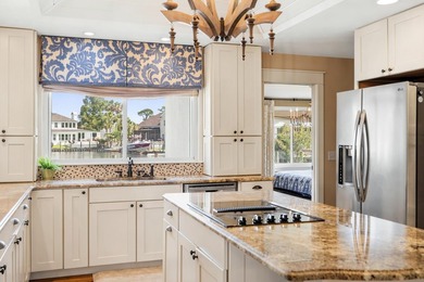 Canal-front living with direct Gulf access defines this - photo 5