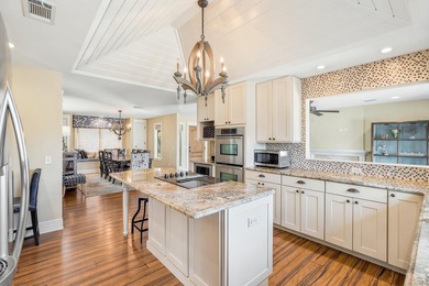 Canal-front living with direct Gulf access defines this - photo 6