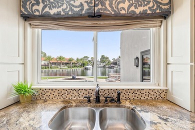 Canal-front living with direct Gulf access defines this - photo 7