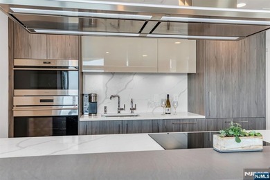 Elevated in every sense, this high-floor residence offers the - photo 15