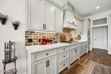 SHOWING LIKE A MODEL HOME, this exceptional custom-built - photo 16