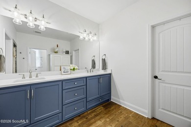 SHOWING LIKE A MODEL HOME, this exceptional custom-built - photo 25