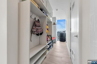 Elevated in every sense, this high-floor residence offers the - photo 26
