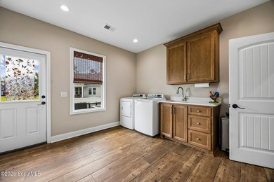 SHOWING LIKE A MODEL HOME, this exceptional custom-built - photo 37