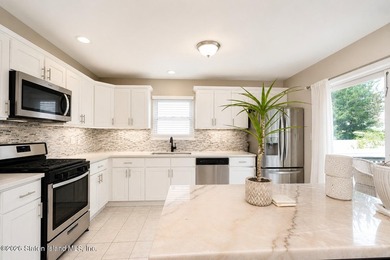 Welcome to 285 Lockman Avenue, a spacious and beautifully - photo 9