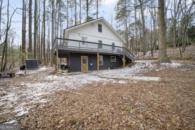 Experience lakefront living with this beautifully renovated home - photo 2